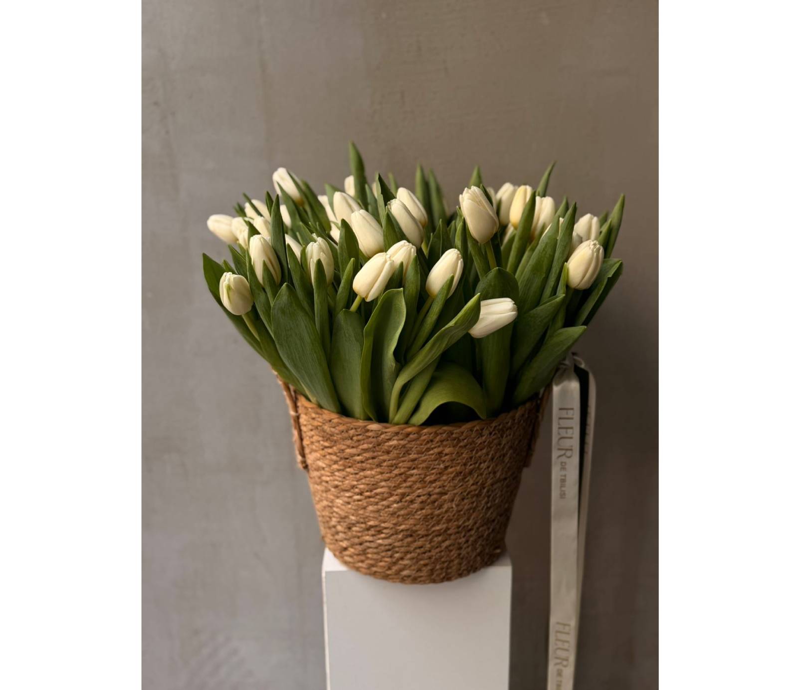 Basket of white tulips